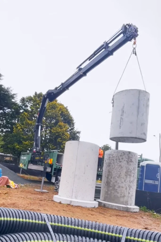 Crane truck service Asheville placing delivering precast concrete and project supplies