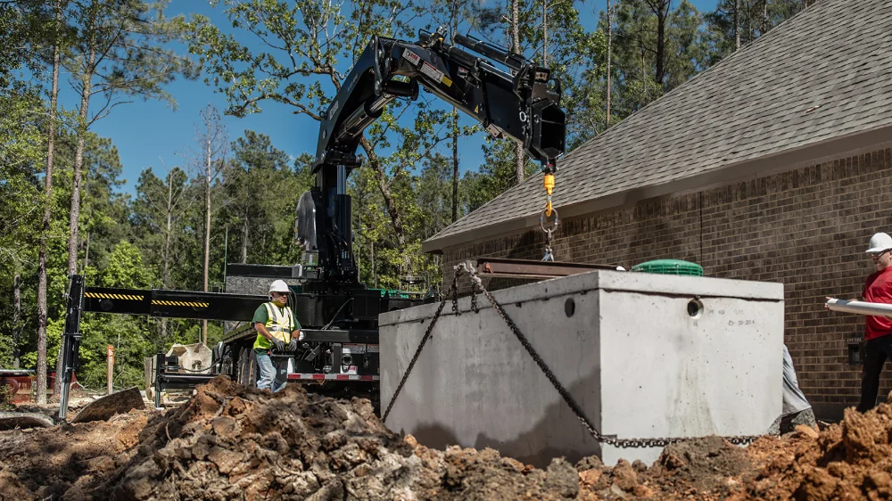 Placing preformed concrete with crane truck in Asheville area