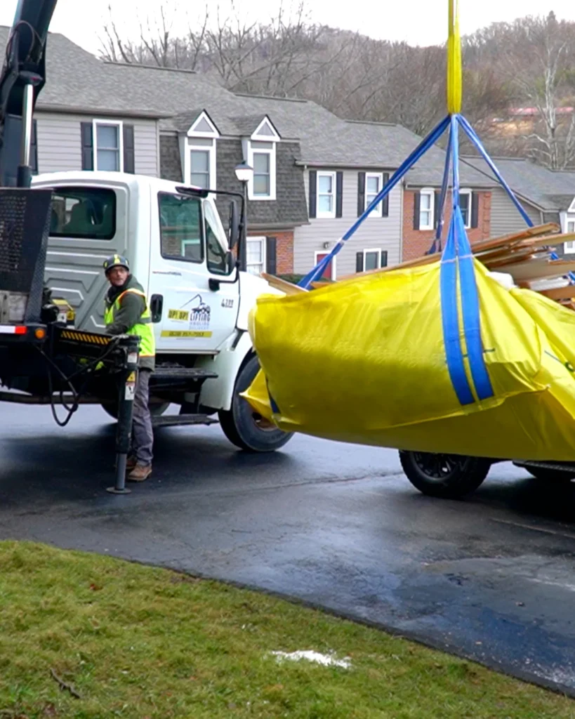 dumpster bag pickup service Asheville NC by Up! Up! Lifting crane truck