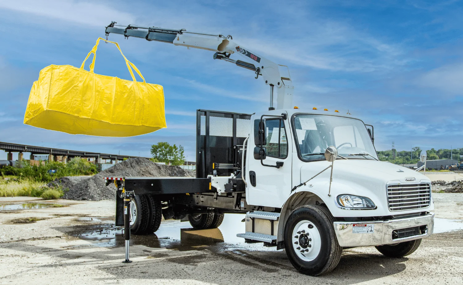 Dumpster bag service Asheville by Up! Up! LIfting crane truck service