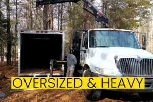 removing oversized heavy items with crane truck in Asheville