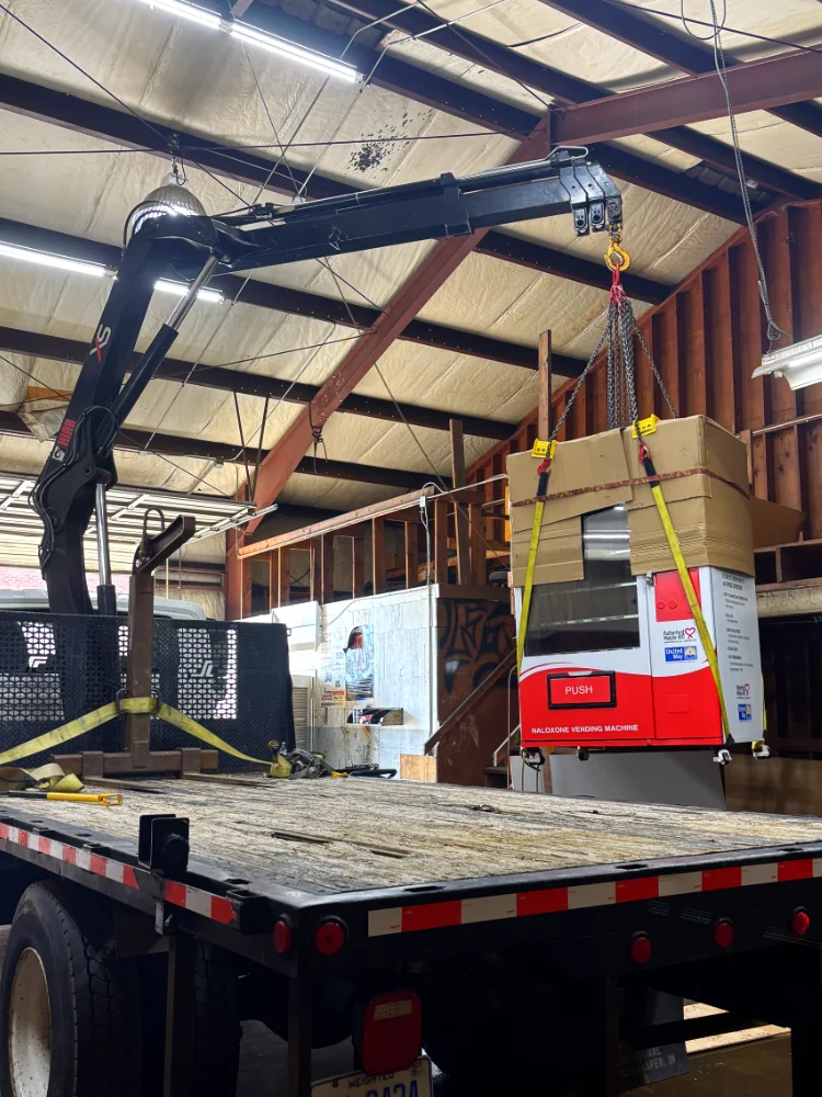 crane truck freight recovery with articulated knuckleboom crane, lifting vending machine by Up! Up! Lifting